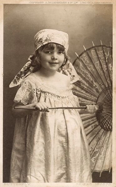 Smiling young girl with a parasol