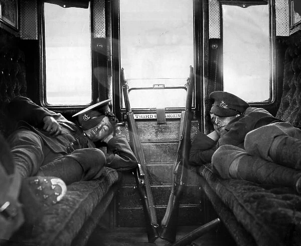 Soldiers asleep in railway carriage during rail strike