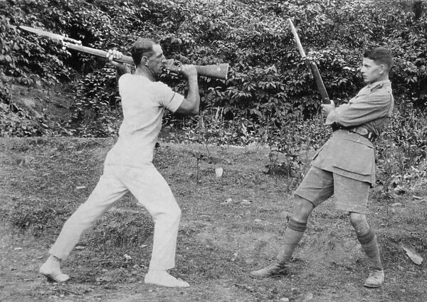 Two soldiers doing bayonet practice, India