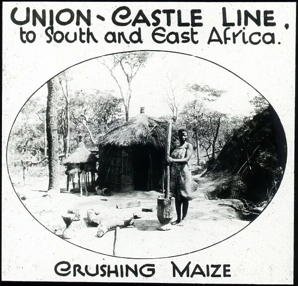 South Africa - Zulu Woman Crushing Maize