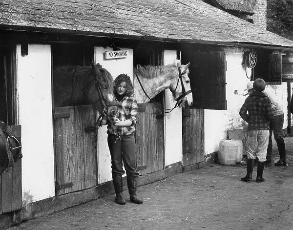 Stable grooms with horses, Porlock, Somerset
