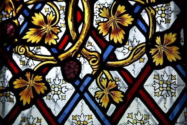 Stained glass window with vines