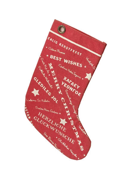 Stocking. Red fabric Christmas stocking, printed on each side with a pattern of stars