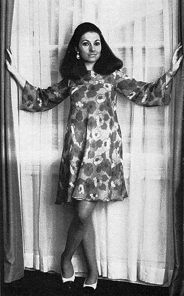 Susan Baptiste wearing a Hildebrand dress, 1966
