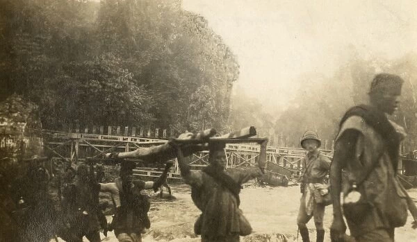 Taking guns across at Nloke Bridge, Cameroon, WW1
