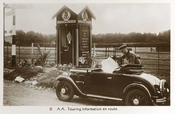 a Touring Booth - Patrolman helps lady with a map