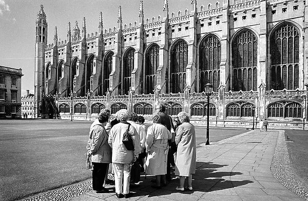 Tourists on a guided tour of Kings College, Cambridge