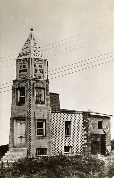 Tower building with evangelical message, North America