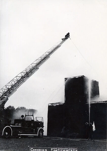 Training. Ladder drill and fire-fighting training on a mocked up building