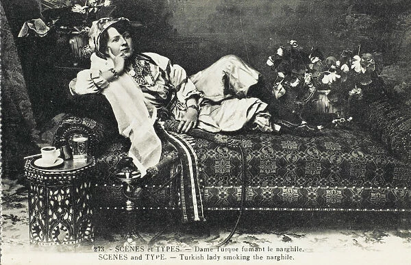 Turkish Lady on a settee smoking