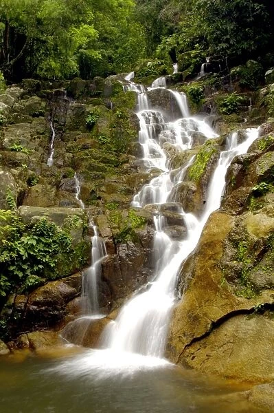An upper part of Mukut Waterfalls, surrounded by