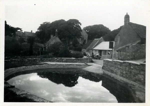 Village and Private Pond, Unknown Location