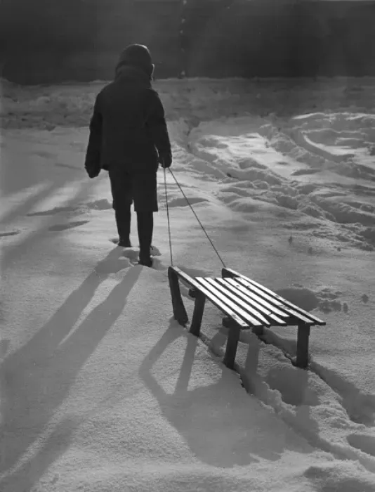 Framed Print : Vintage Print of Boy Pulling Sledge through Snow Framed Print : Vintage Print of Boy Pulling Sledge through Snow