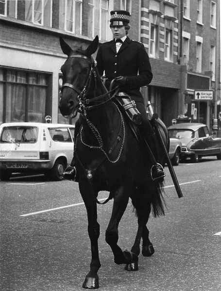 Woman police officer on horseback, London
