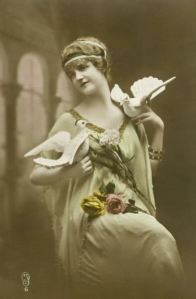 Woman posing with doves and flowers