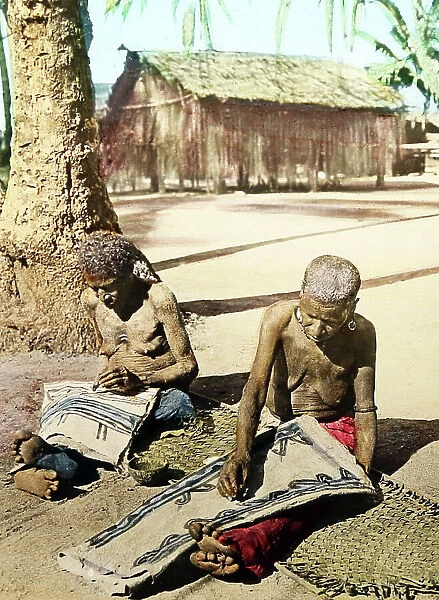 Women dress making in Papua New Guinea, Victorian period