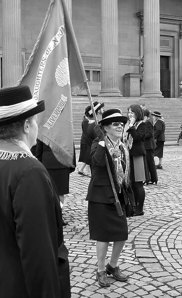 Women taking part in a parade, Liverpool, England