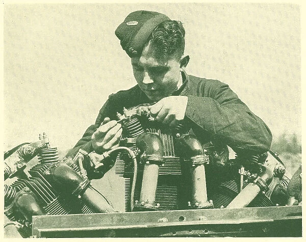 WW2 - R. A. F. Trainee Assembling Engine