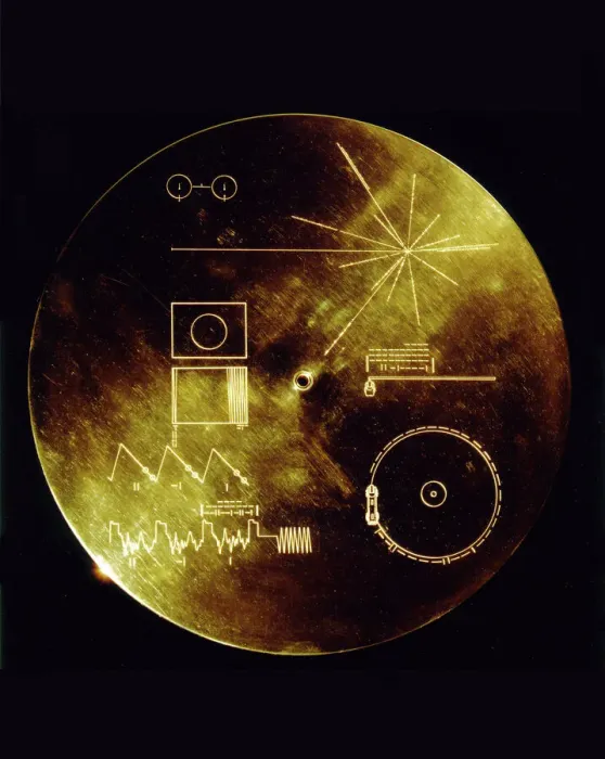 Framed Print : The Sounds of Earth Record Print: A 12-inch gold-plated copper disc in a protective aluminum cover Framed Print : The Sounds of Earth Record Print: A 12-inch gold-plated copper disc in a protective aluminum cover