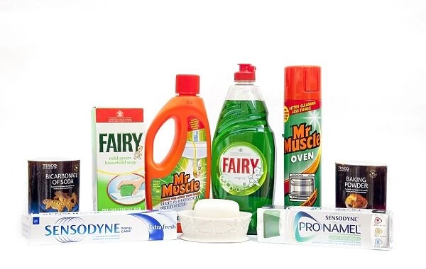 Display of household items containing alkalis including baking powder bicarbonate soap toothpaste washing up liquid oven cleaner - UK