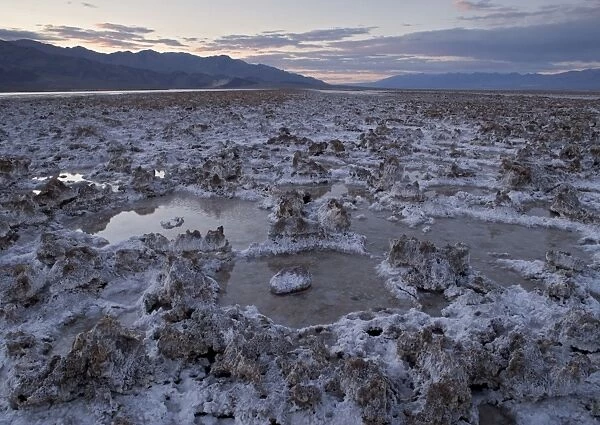 Salt Lake - at sunset, unusually full of water in high rainfall El Nino year. Death Valley National Park, USA