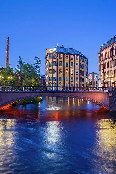 Sweden, Norrkoping, early Swedish industrial town, Arbetets Museum, Museum of Work in former early 20th century mill building, dusk Date: 16-05-2019