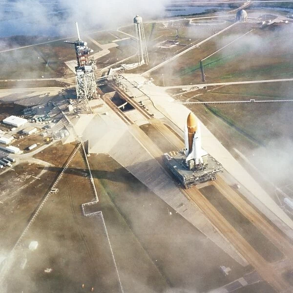 Aerial view of Shuttle STS-6 on way to launchpad