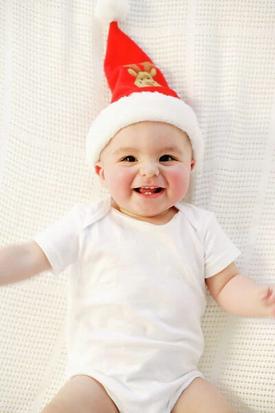 Baby boy. MODEL RELEASED. Baby boy. Nine month old boy wearing a Christmas hat