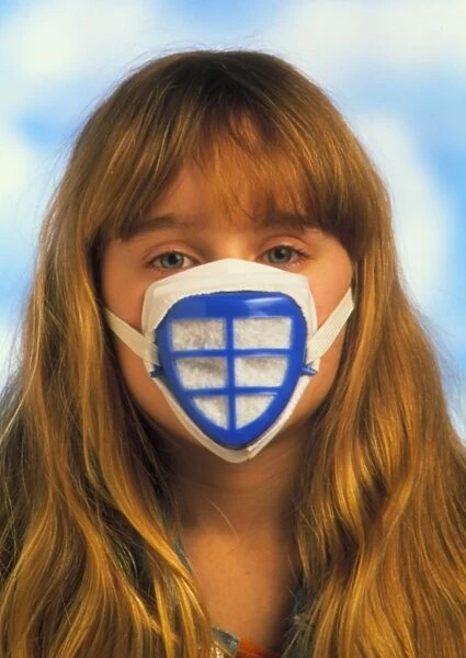 Child wears mask to protect against air pollution