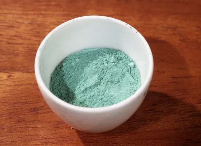 Framed Print : Copper carbonate Print: Green solid in a crucible Framed Print : Copper carbonate Print: Green solid in a crucible