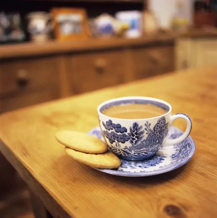 Framed Print : Print of a Cup of Tea Served with Biscuits Framed Print : Print of a Cup of Tea Served with Biscuits
