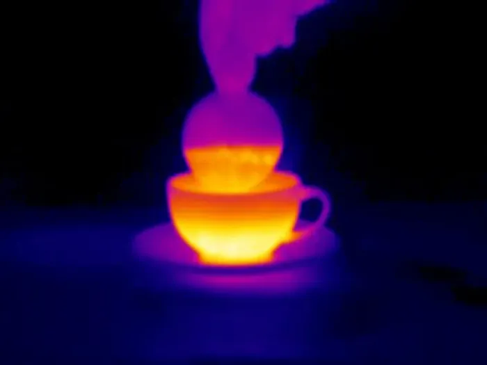 Framed Print : Thermogram Print of a Hand Dipping a Biscuit into Tea Framed Print : Thermogram Print of a Hand Dipping a Biscuit into Tea