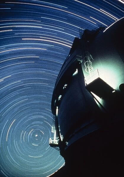 The dome of the Keck Telescope and star trails