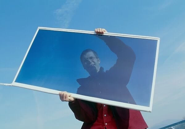 Man holding an opaque gasotrope window