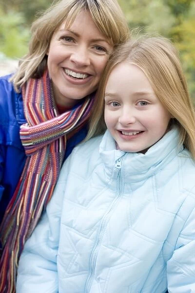 Mother and daughter outdoors in winter