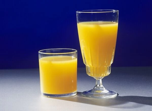 Orange juice in two containers