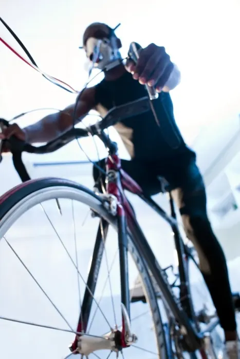 Framed Print : Performance testing Print: Athlete on exercise bike Framed Print : Performance testing Print: Athlete on exercise bike