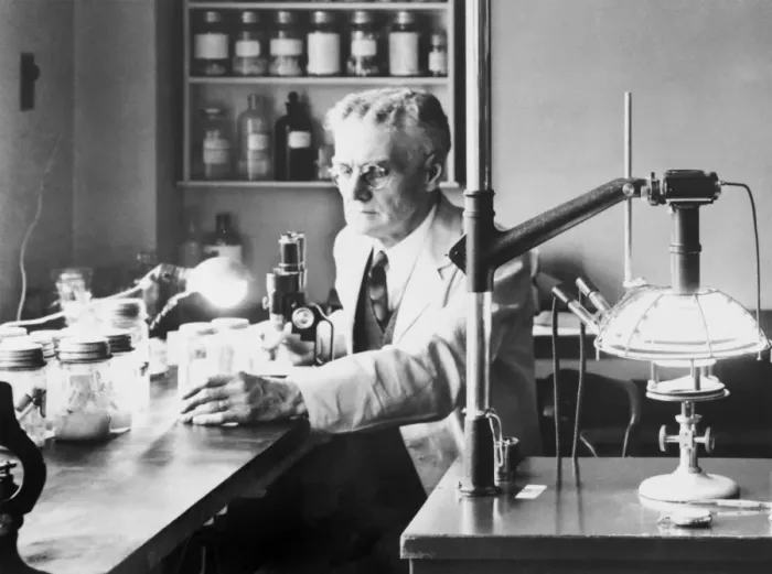 Framed Print : Print of Robert Cooley in his laboratory, photographed on 21 April 1938