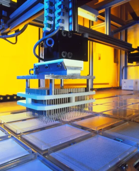 Framed Print : Robot loading DNA into plates for genome mapping Print Framed Print : Robot loading DNA into plates for genome mapping Print