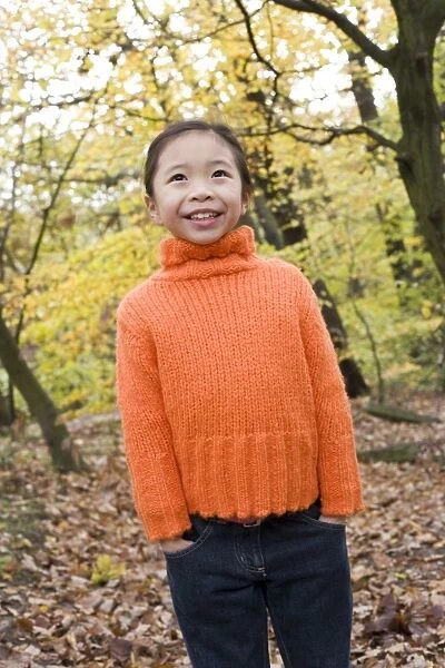Smiling girl in a wood