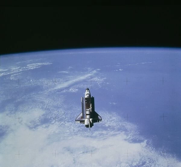 Space shuttle Challenger STS-7 orbiting Earth