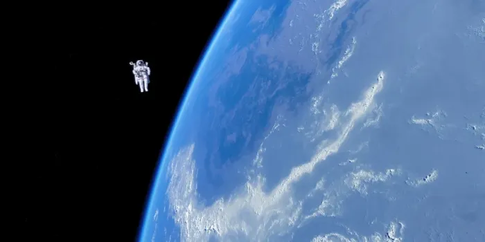 Framed Print : Spacewalk Print: Astronaut in a Manned Maneuvering Unit above the Earth Framed Print : Spacewalk Print: Astronaut in a Manned Maneuvering Unit above the Earth