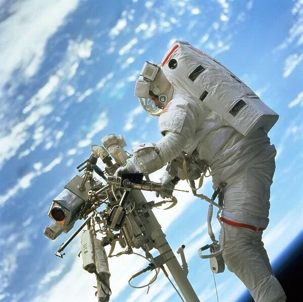 Spacewalk. Astronaut Steven L. Smith performing an extravehicular activity 