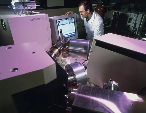 Technician uses an isotope ratio mass spectrometer