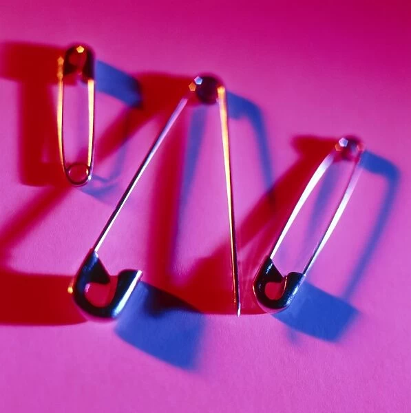 View of three safety pins