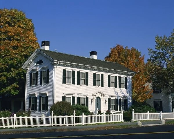 645-1135. Exterior of a traditional large white house at Woodstock