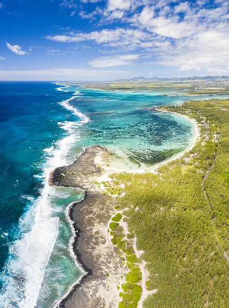 Aerial panoramic of tropical Public Beach washed by the ocean waves, Poste Lafayette