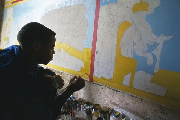 Boy working in Aleka Gamid Gidey painting workshop, Zege peninsula, Lake Tana