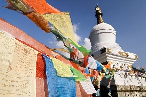 Buddhist prayer flags and stupa atop Paoma Shan, Kanding, Sichuan, China, Asia