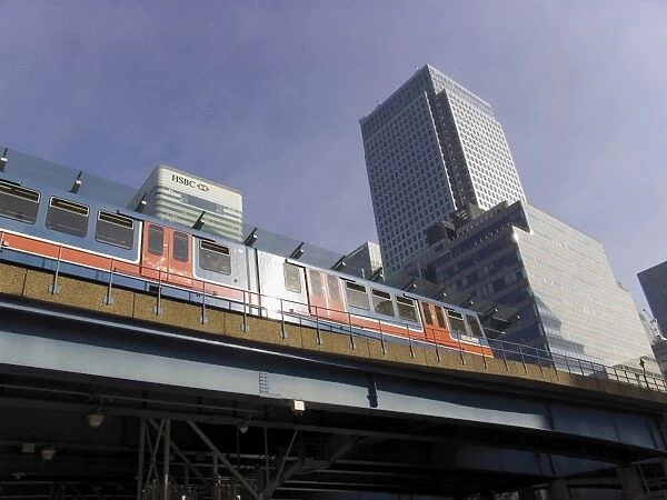 Canary Wharf tower and West India Dock, Docklands Light Railway station